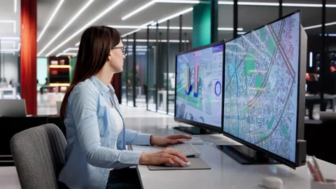 Civil Engineer Studies Property Maps On Computer Video stock 330254034