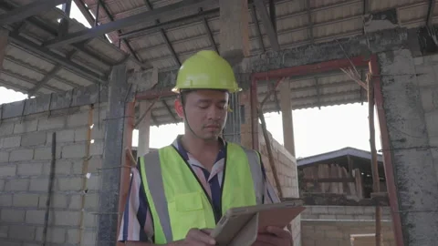 Civil engineering inspecture house building with tablet computer Stock Footage 150288549