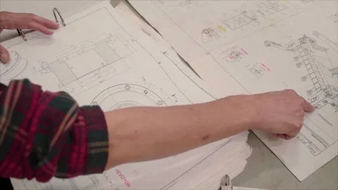 Civil engineering team Along with the architect and foreman watching Stock Footage 246606741