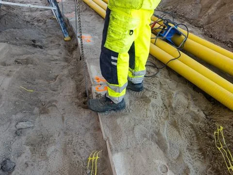 Civil engineering work on underground utility installation Stock Photos