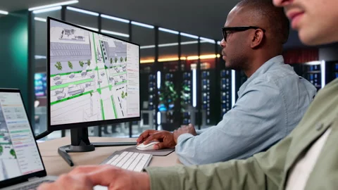 Civil Engineers Analyze Traffic Flow Using 3D Mapping Software Stock Footage 334922357