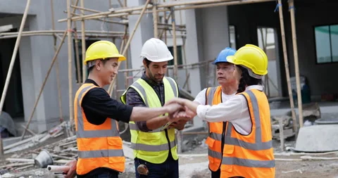 Civil engineers join hands to applaud a job well done. Stock Footage 194546109