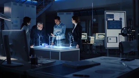 Civil Engineers Makes a Presentation with Augmented Reality 3D Wind Turbine Stock Footage 116721284