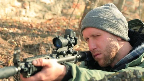 Civil man  with automatic rifle. Close up     Stock-Footage 69879158