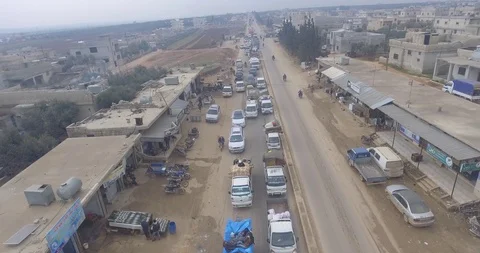 Civil migration accelerated with the growth of the war in the Idlib region. Stock Footage 125762936