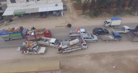 Civil migration accelerated with the growth of the war in the Idlib region. Stock Footage 125762970