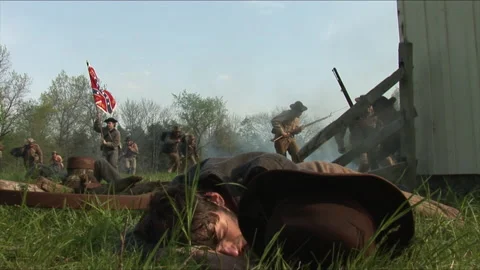 Civil War Battle "Combat Camera" with charging Confederates - Reenactment Stock Footage 183682611