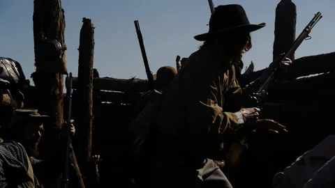 Civil War Confederates fire from inside earthworks trenches Stock Footage 169662787