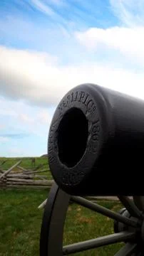 Civil War Front of Cannon on a Battlefield in the Spring Daylight Sun and Clouds Stock Photos