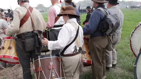 Civil War - Handheld Camera of Confederate Soldier Drummers on Battlefield Stock Footage 148379644