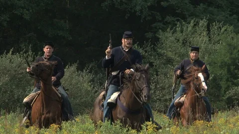 Civil War Union Army Cavalry - On Horseback in open grassy field with revolvers Stock Footage 105688741