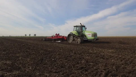 Claas tractor on a field Stock Footage