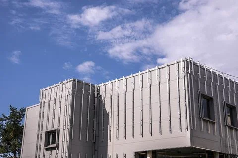 Cladding facades with decorative panels. Building house Stock Photos