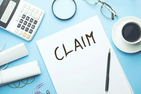 Claim text on paper Stock Photos