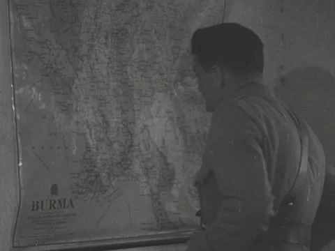 Claire Lee Chennault studies a map of Burma Video stock 158183897
