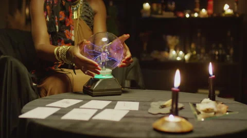 Clairvoyant Working with Crystal Ball when Sitting in Her Studio Stock Footage 247638768
