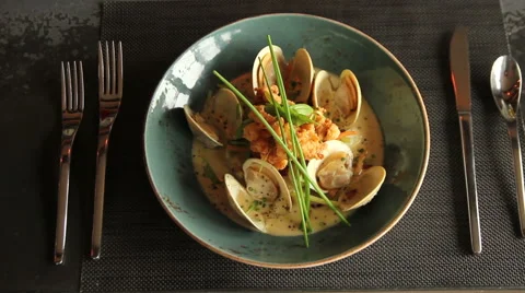 Clam dinner with sauce, pan left and right Stock Footage 44617264