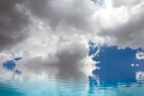 Clam sea. a sky of clouds reflected in a water surface. 스톡 일러스트