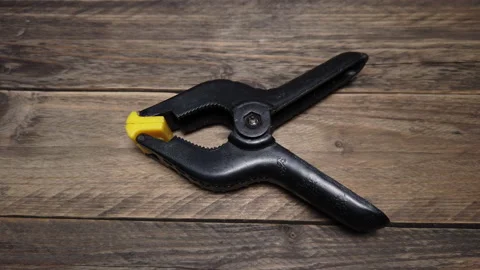 Clamp for clamping and securing workpieces Stock Footage 203973699