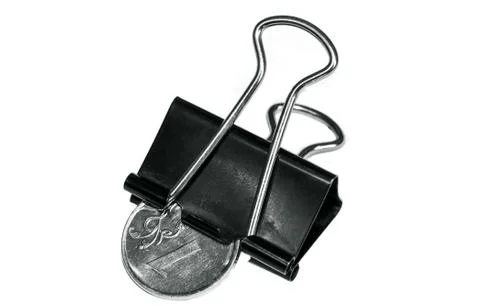 The clamp with a coin Foto stock