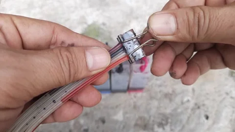 Clamp the printer infusion ink hose using a binder clip, 4k footage Stock Footage 251795916