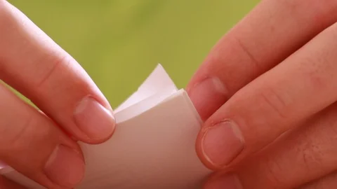 Clamping sheets of paper with paper clips Stock Footage 87545673