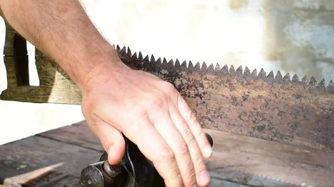 Clamps a hacksaw in a vice Stock Footage 115476827