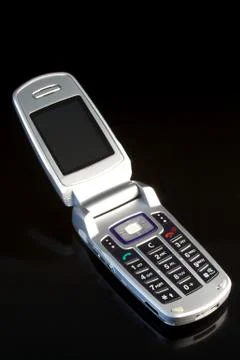 Clamshell Mobile Phone on black background Stock Photos
