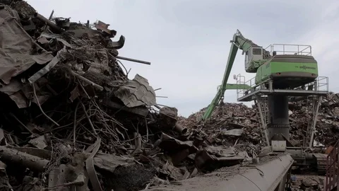 Clamshells sorting the scrap metal, general shot Stock Footage 71592486