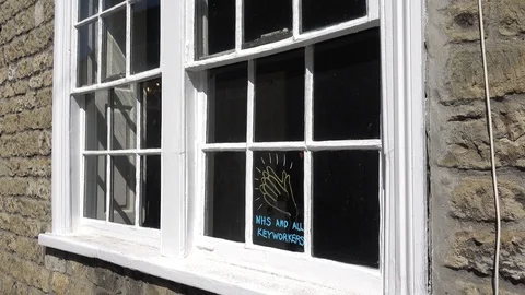 Clap for NHS and Key Workers window message Stock Footage 129758568