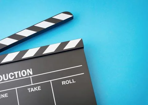 Clapboard on blue background Stock Photos