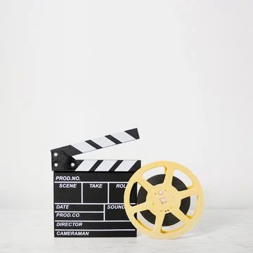 Clapboard with film reel. High quality photo Stock Photos