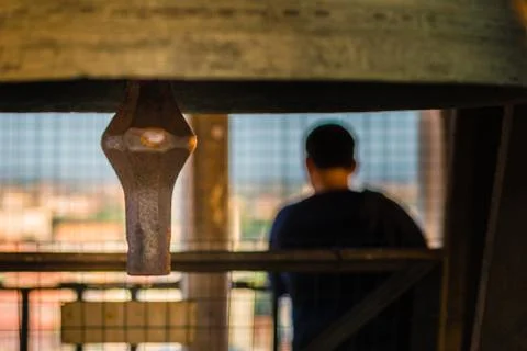 Clapper of ancient bell Stock Photos