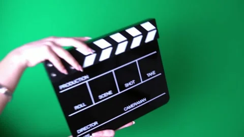 Clapper board Green Screen in girl Hand Stock Footage 252000931
