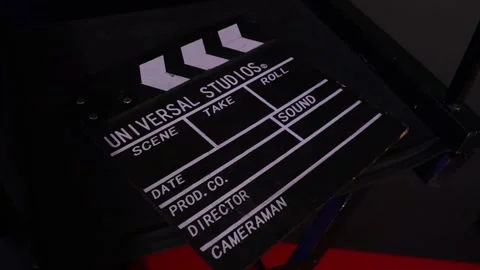Clapperboard on a chair 스톡 동영상 169692566