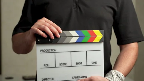 Clapperboard held by filmmaker before shooting Stock Footage 316233672