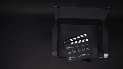 Clapperboard or clap board or movie slate with director chair use in video pr Stock Photos