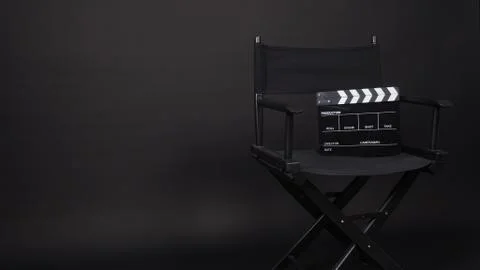 Clapperboard or clap board or movie slate with director chair use in video pr Stock Photos