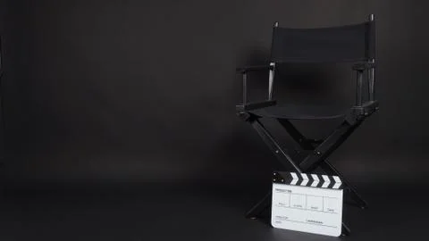 Clapperboard or clap board or movie slate with director chair use in video pr Stock Photos