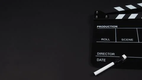 Clapperboard or clap board or movie slate with pen use in video production ,f Stock Photos