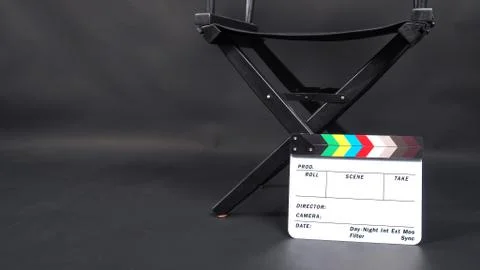 Clapperboard or clap board or movie slate with director chair use in video pr Stock Photos