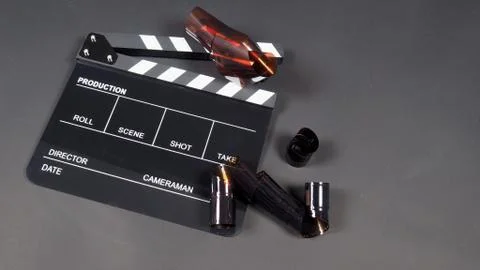 Clapperboard or clap board or movie slate with film use in video production , Stock Photos