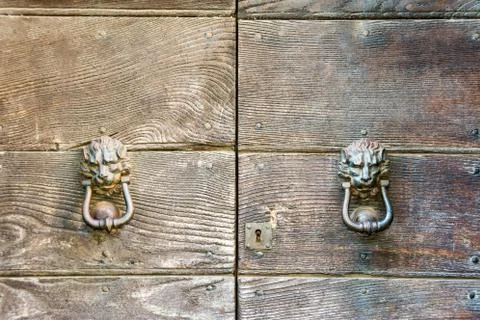 Clappers of an ancient door Stock Photos