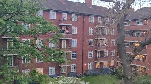 CLAPPING FOR CARERS NURSES AND ESSENTIAL WORKERS COVID19 LOCKDOWN LONDON Stock Footage 128543942