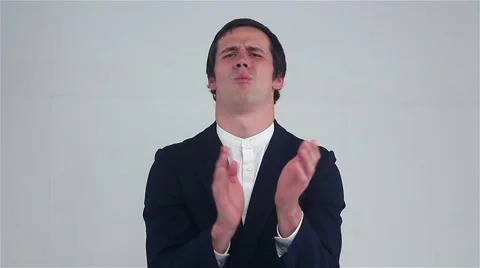 Clapping sarcastically. young man applauding. Stock Footage 68965229