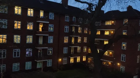 CLAPPING TOGETHER FOR ESSENTIAL WORKERS DURING COVID-19 UK LOCKDOWN, 4K Stock Footage 127592557