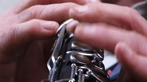 Clarinet fingers a singer during a performance of music Stock Footage 95736737