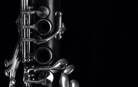 Clarinet keys on black Stock Photos