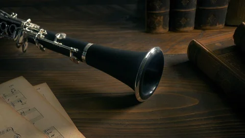 Clarinet On Table With Books Stock Footage 128375613