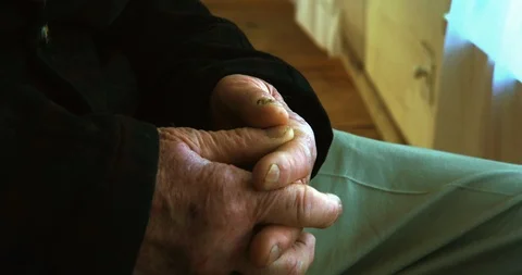Clasped hands of a senior man. 스톡 동영상 88374401